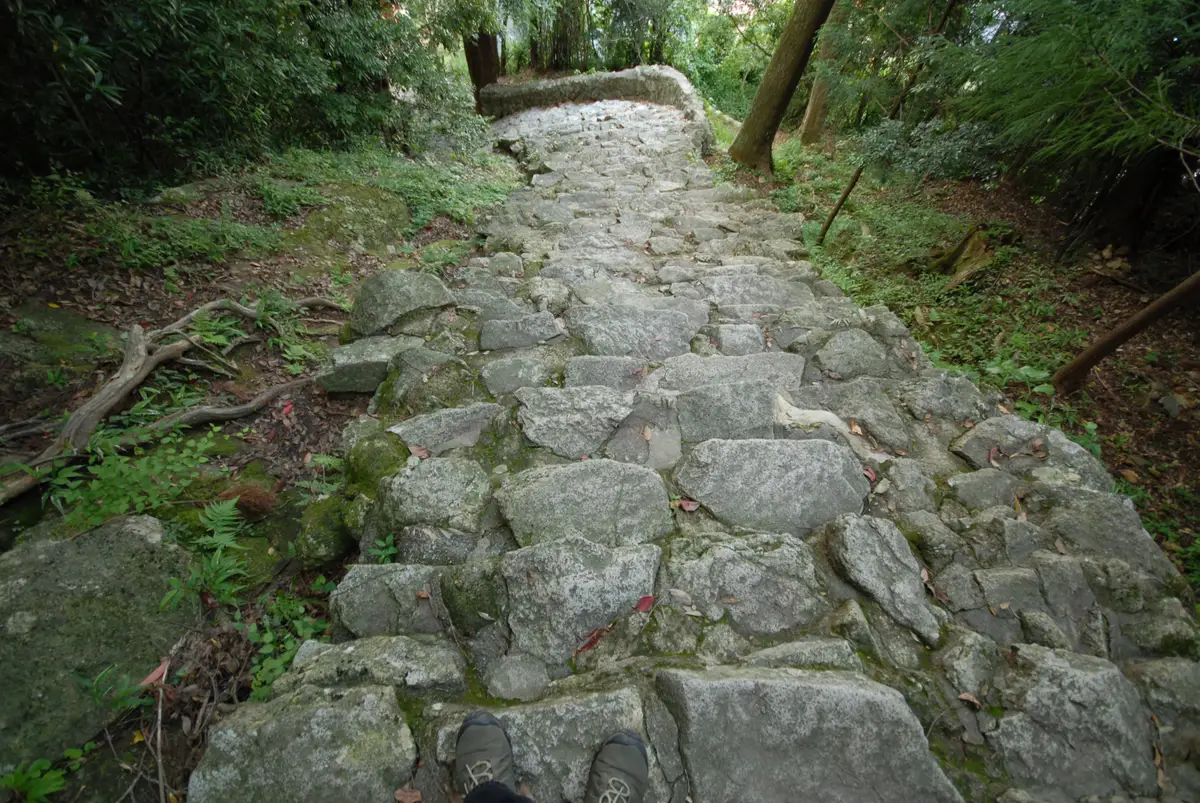 The steep, uneven 538-step stone stairway up to Gotobiki-iwa at Kamikura-jinja